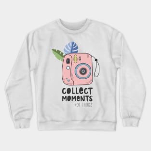 Instant camera with photos. Illustration with a camera and tropical leaves and the inscription. Appreciate moments, not things Crewneck Sweatshirt